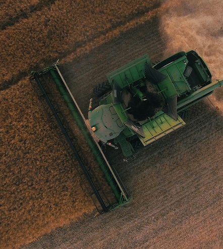 Combine harvester working in a field